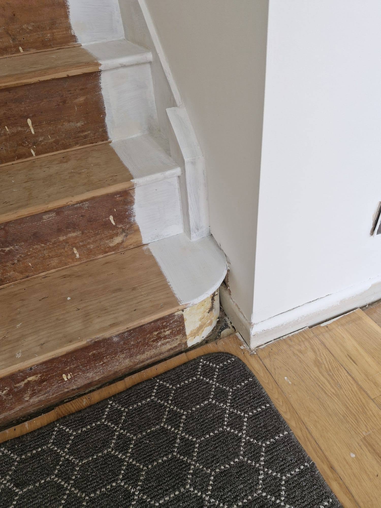 Completed Elite staircase renovation in a customer hallway with bespoke joinery details