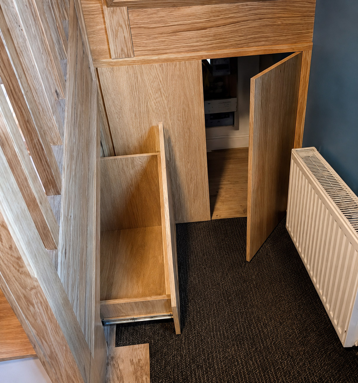 Additional bespoke pull-out understairs storage project by Elite