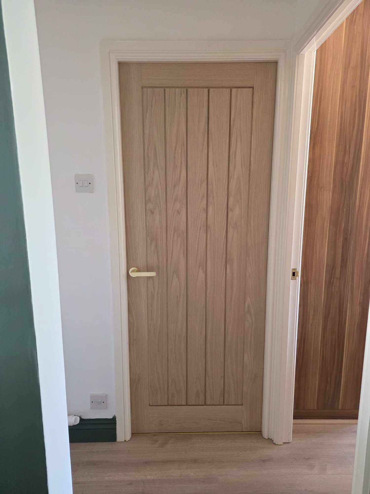 Completed oak doors, staircase and custom joinery work by Elite, view 2